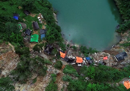 Fig 1c. Illegal Gold Miners around the Lake of PT. NMR Post Mining